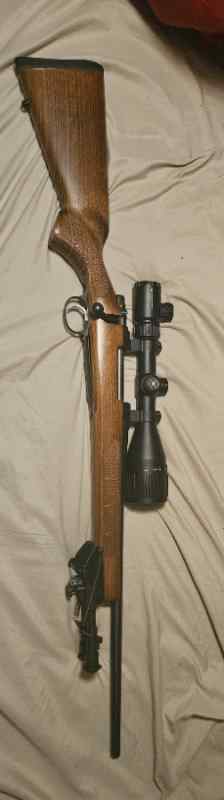 CZ 557 bolt action 30-06 walnut stock vortex cross