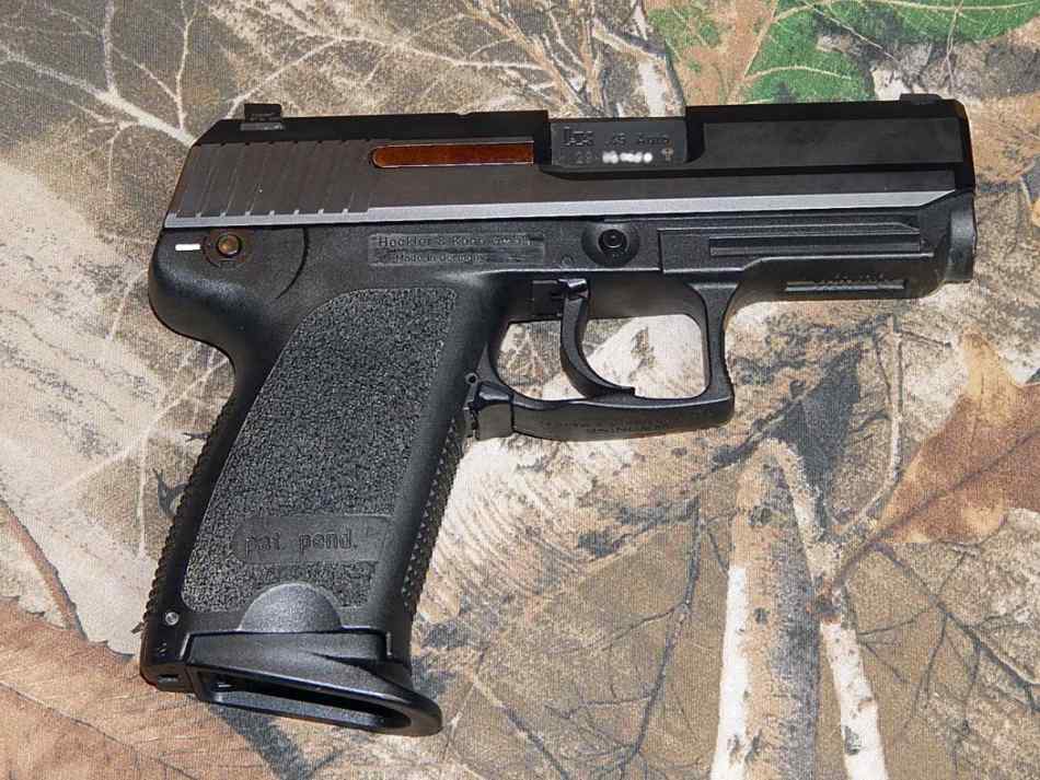 HK USP 45 Auto Compact with two mags.