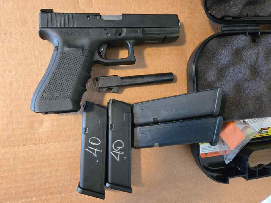 Glock 22 with conversion barrel and 4 mags