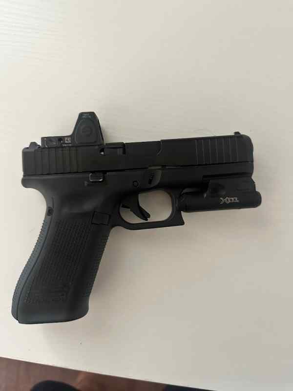 Glock 45 MOS w/ Trijicon RMR and surefire xc1 