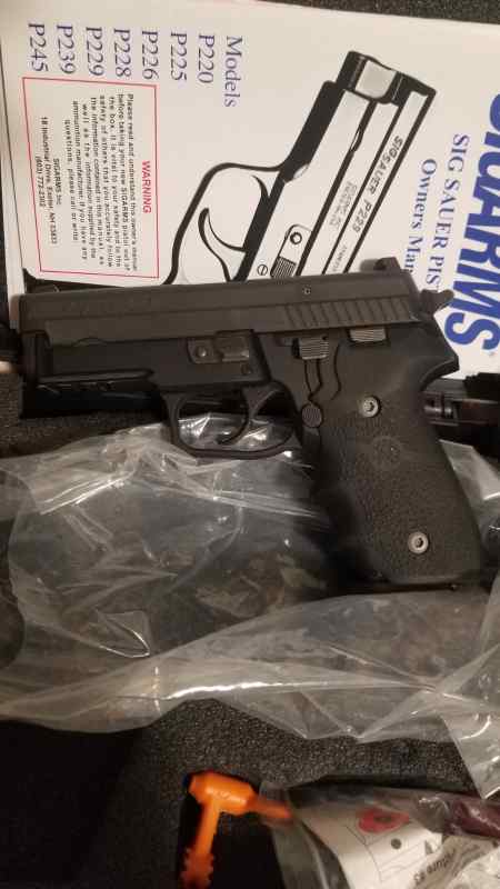 Sig sauer p229R with night sights and SRT