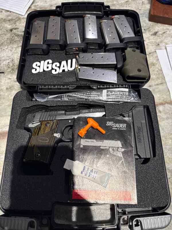 Sig Sauer P938 EQUINOX loaded with extras