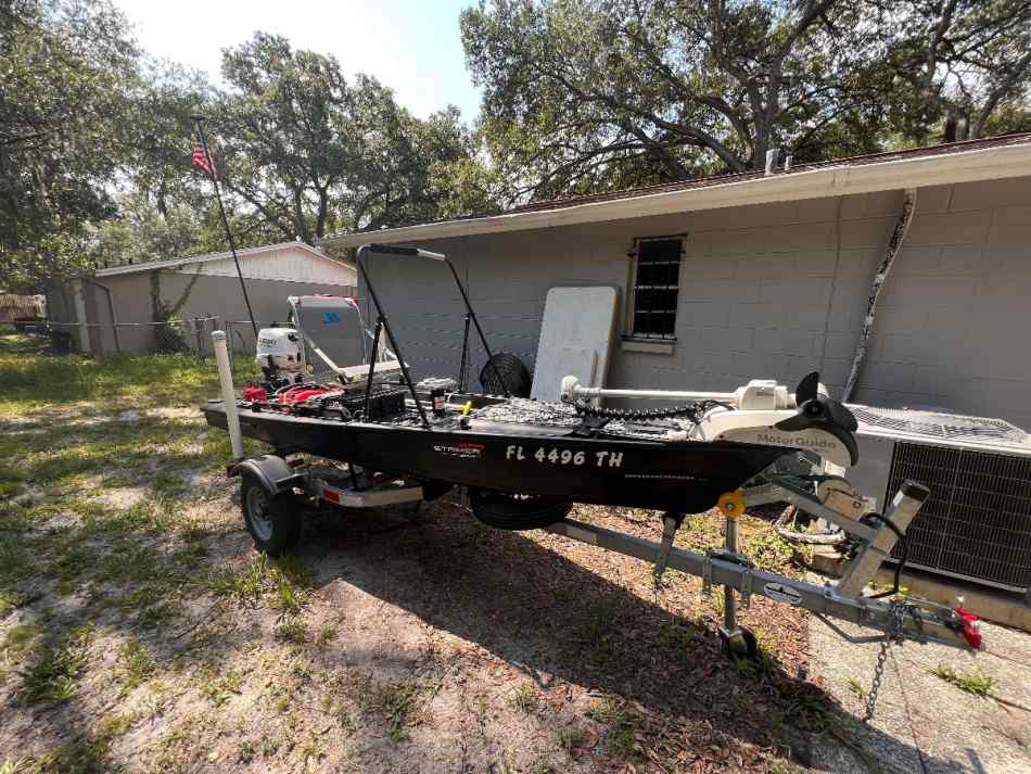 Solo skiff 6hp Suzuki, pwr pole, trolling motor