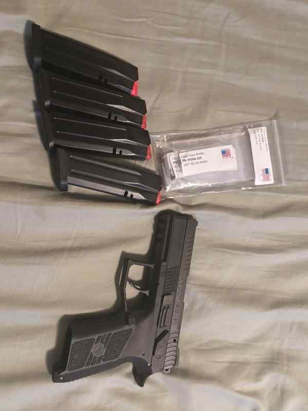 Used Cz p07 + Cajun gun works pro kit