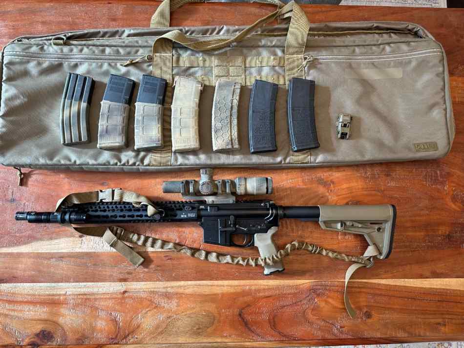 AR15 with scope, bag and magazines