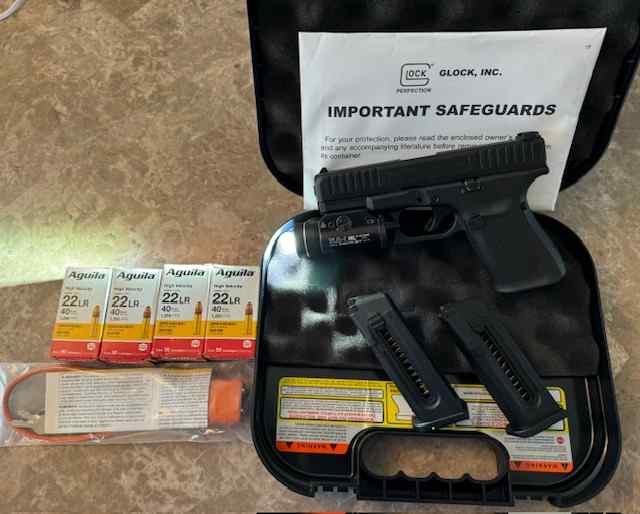 New in box Glock 44 with many extras. 