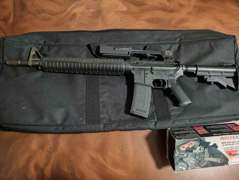 Bushmaster AR-15 w/ Trijicon Reflex RX01NSN