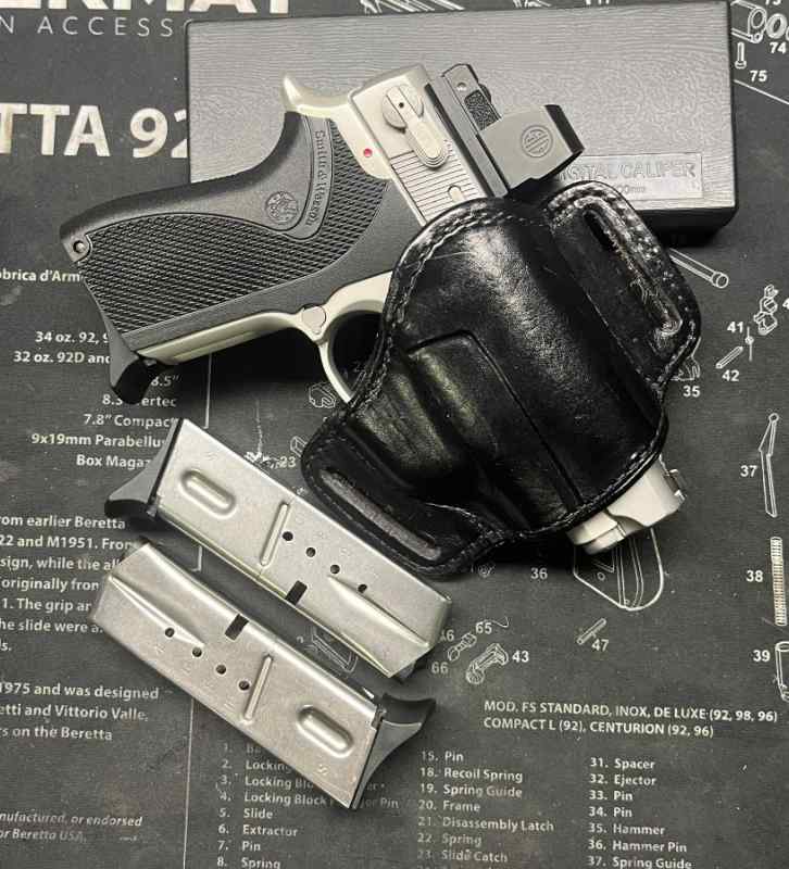 Smith &amp; Wesson 6906, red dot, 3ea mags, holster