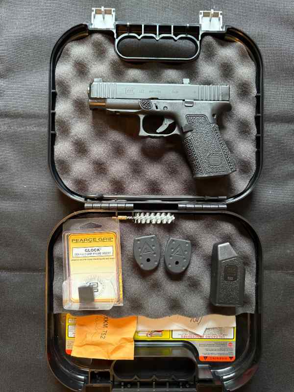 Glock 48 with Trijicon RMRcc direct optic cut