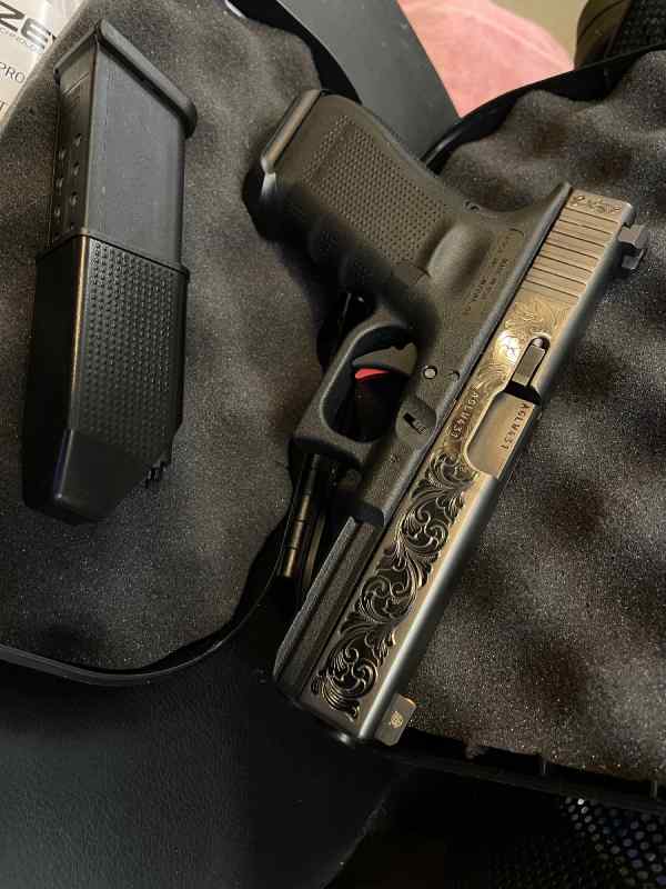 new gen 4 glock 17 factory engraved/ZEV