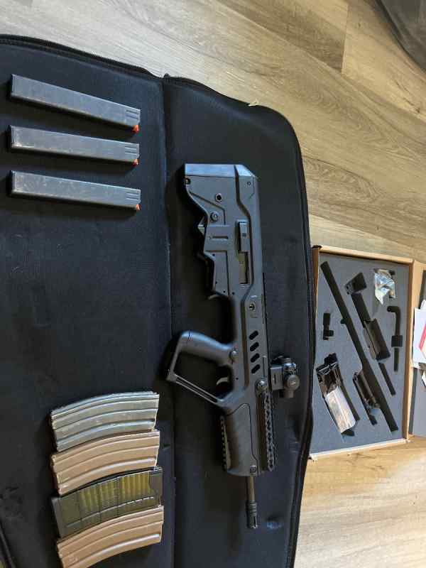 Tavor sar with 5.56 and 9mm conversion 