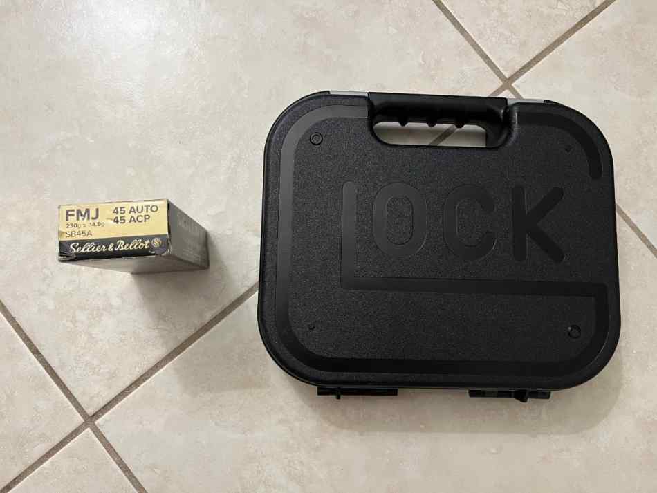 Glock case and 50 rounds of 45 Auto/Acp ammo 