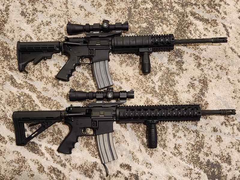 2 Bushmaster Maine ARs YHM Black Diamond &amp; Leupold