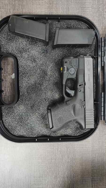 Glock 27 with TRL6 light/laser w/night sights