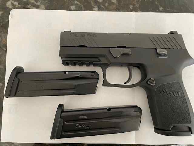 Sig Sauer 9mm P320 Compact Carry Plus 3 Mags