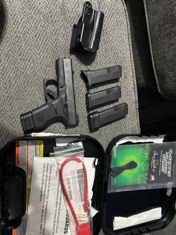 Glock 42, 4-mags(2 extended) case, holster $400fir