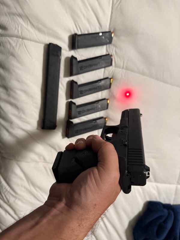 Glock 23 19 with crimson trace and 7 mags