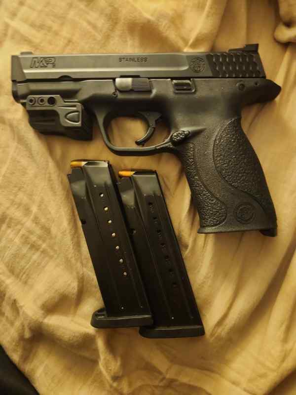 S&amp;W, M&amp;P 9mm 1.0 full size. 16+1, trijicon sites. 