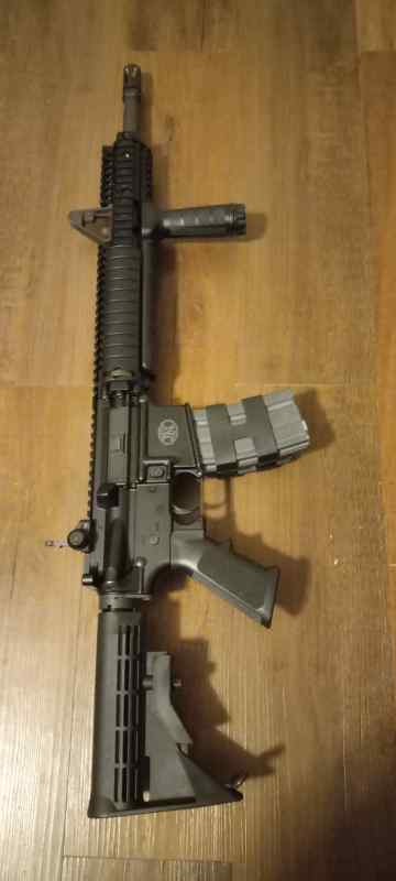 FN15 with Daniel Defense rail and KAC rear sight. 